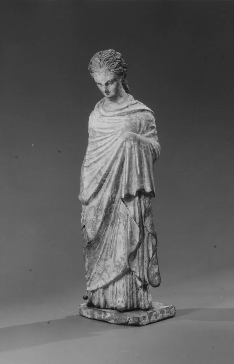 Terracotta statuette of a woman — Unknown