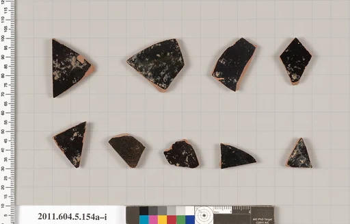 Terracotta fragments of kylikes (drinking cups)