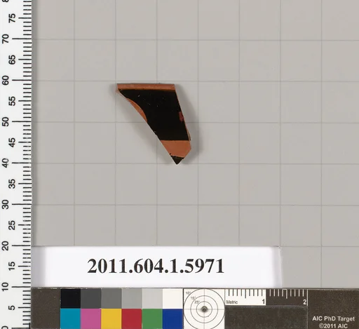 Terracotta rim fragment of a kylix (drinking cup)