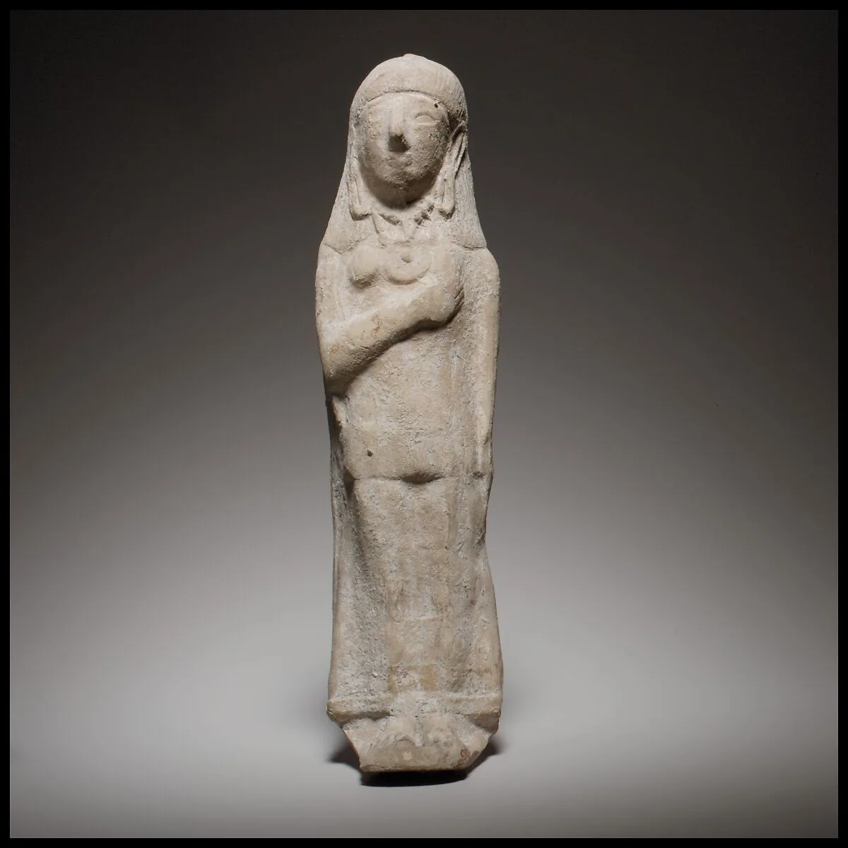 Terracotta statuette of a woman — Unknown