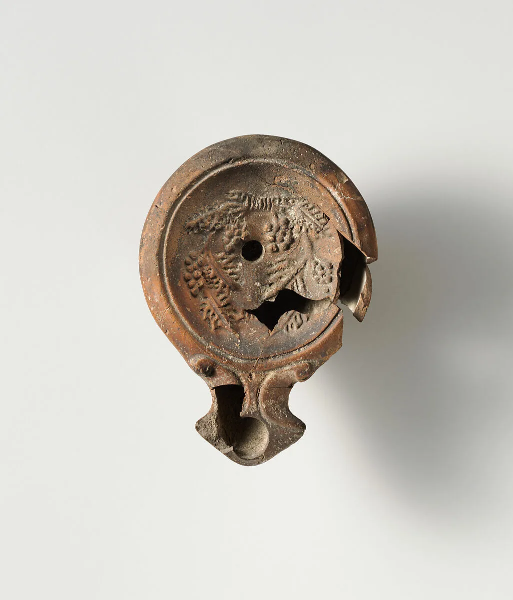 Terracotta oil lamp — Unknown