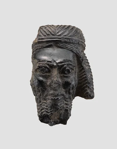Head of a male figure
