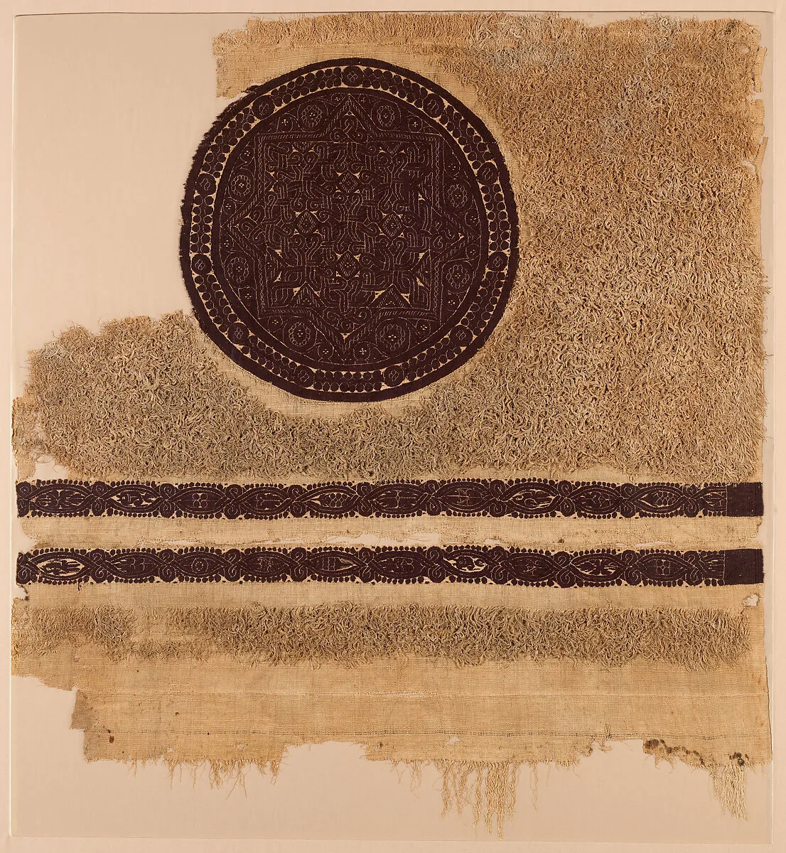 Fragment of a Cover or Blanket with Interlace Roundel and Stripes — Unknown