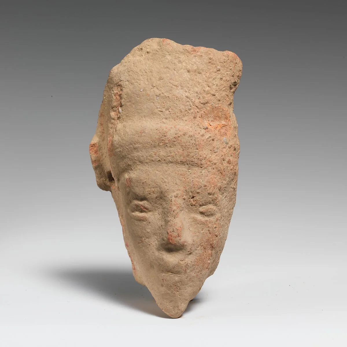 Fragment of a terracotta head — Unknown