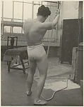 [Male Model Posed Pulling a Rope in Anna Huntington's Rooftop Studio]