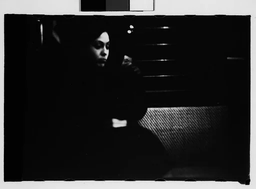 [Five 35mm Film Frames: Subway Passengers, New York City: Woman, Man Reading Newspaper, Man in Suit]