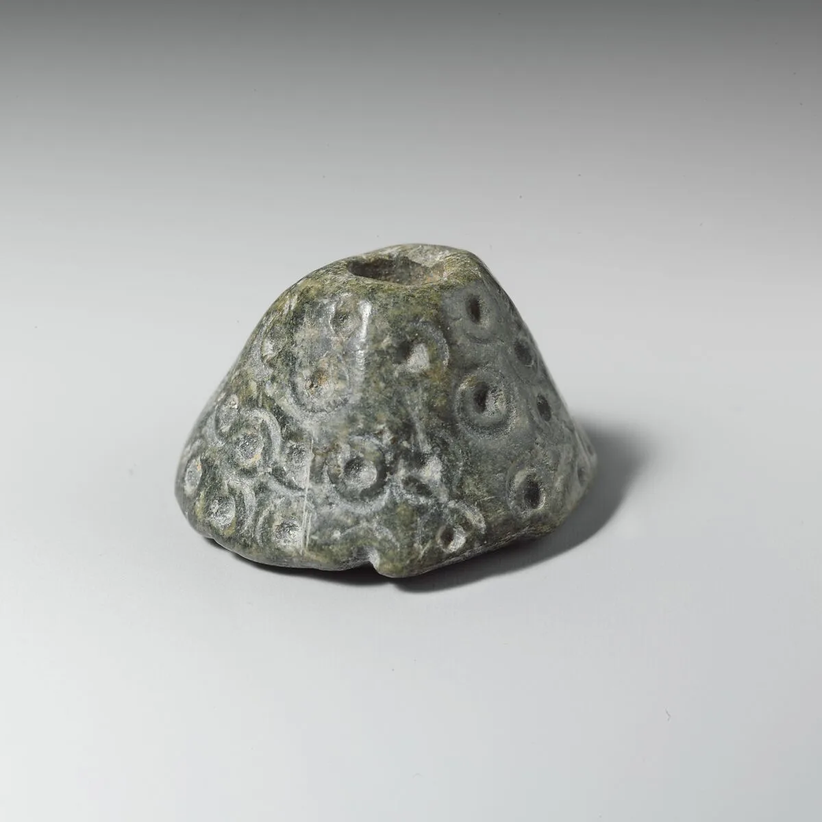 Steatite spindle whorl — Unknown