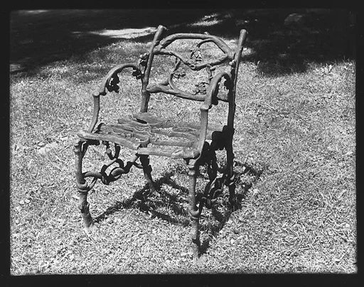 [Iron Chair on Lawn]