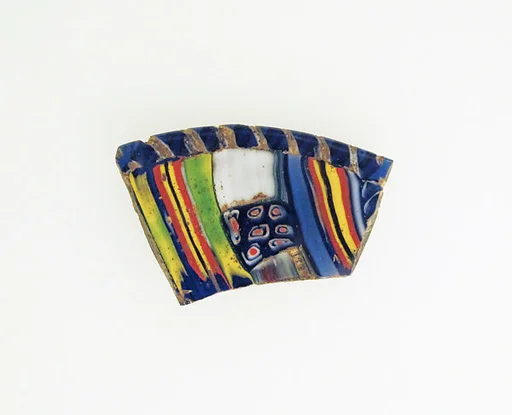 Striped mosaic glass lens-shaped dish fragment