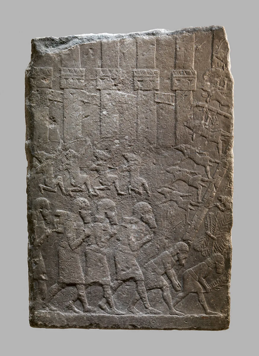 Battle scene of Assyrians storming a citadel — Unknown