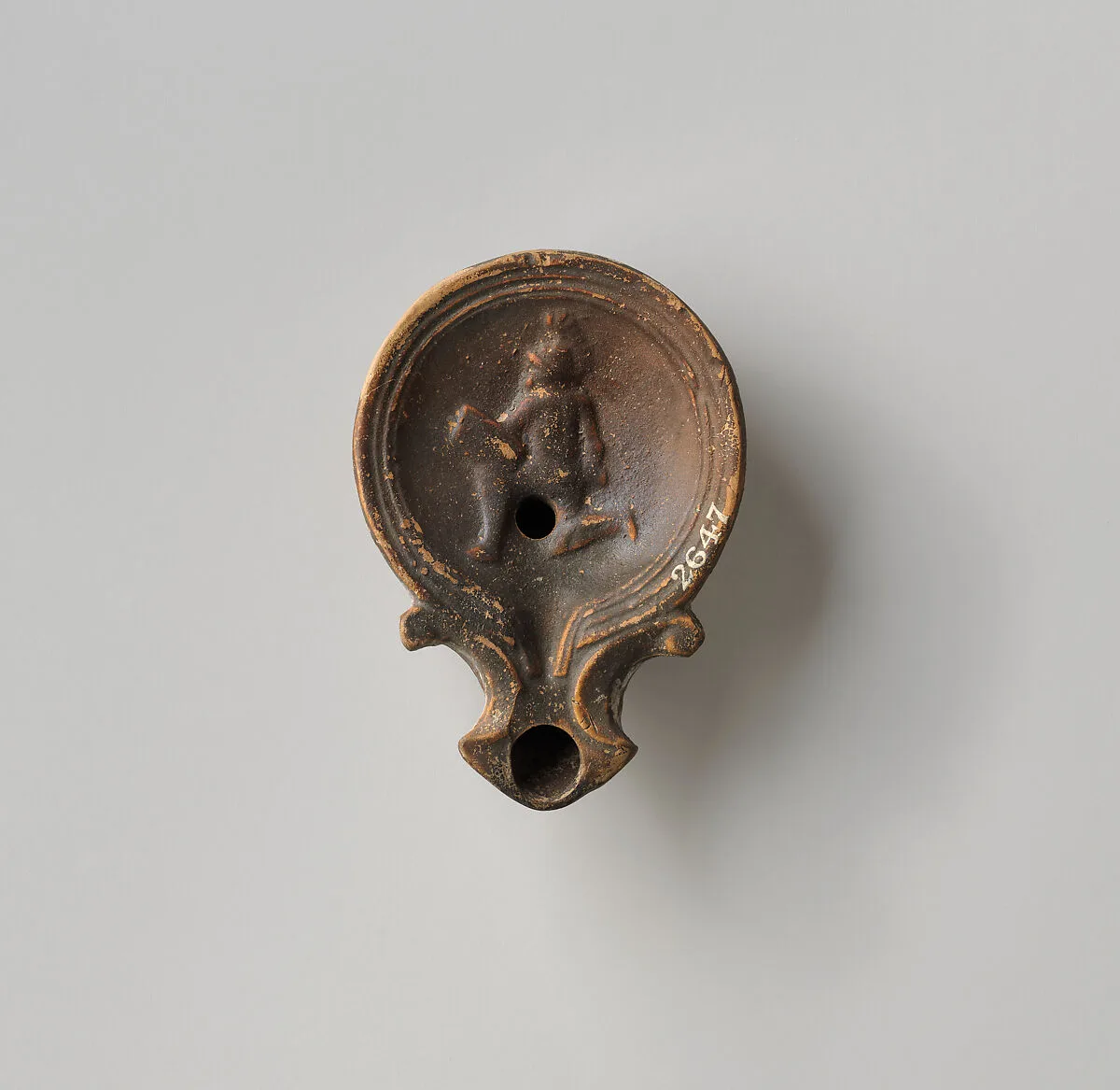 Terracotta oil lamp — Unknown
