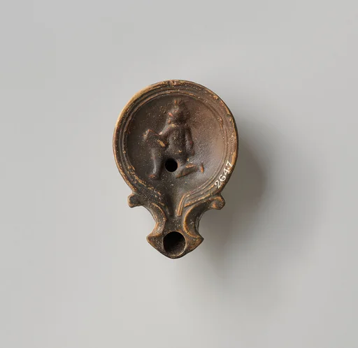 Terracotta oil lamp