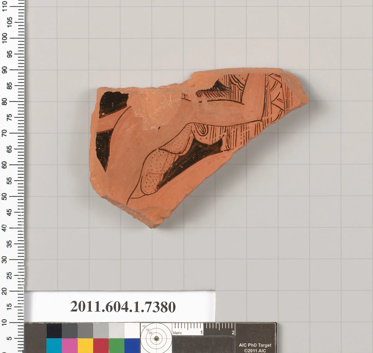 Terracotta fragment of a kylix (drinking cup) — Makron