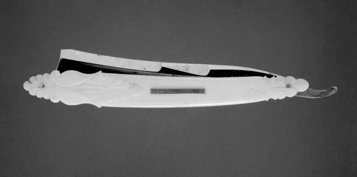 Four razors with ivory handles (part of a set) — Hawcroft & Pearson, England