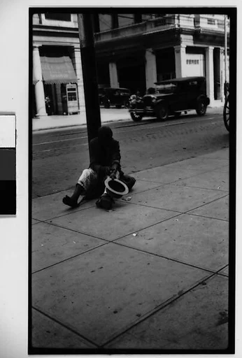 [Beggar Seated on Street, Havana]
