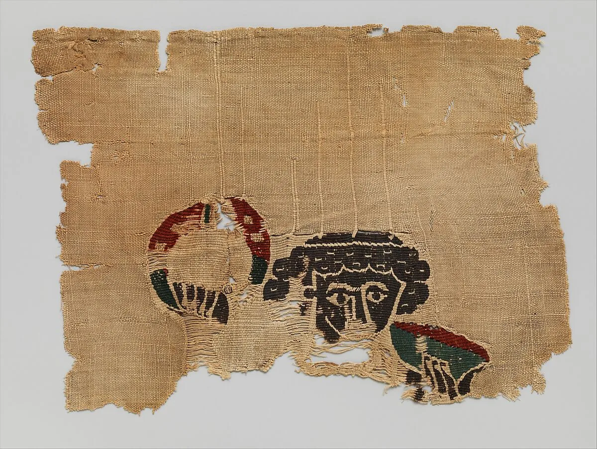 Fragment with the Head of a Figure — Unknown