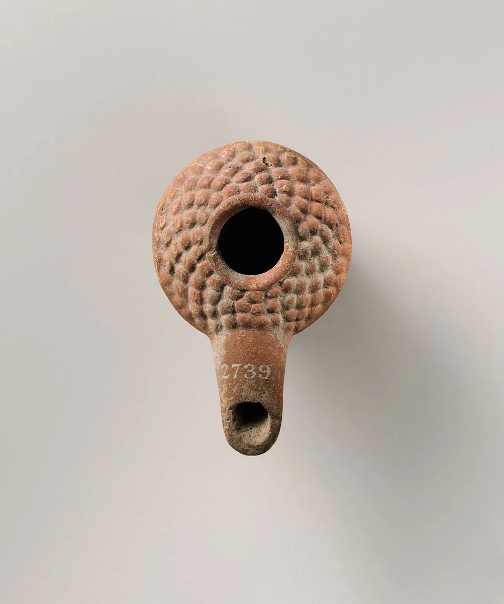 Terracotta oil lamp — Unknown