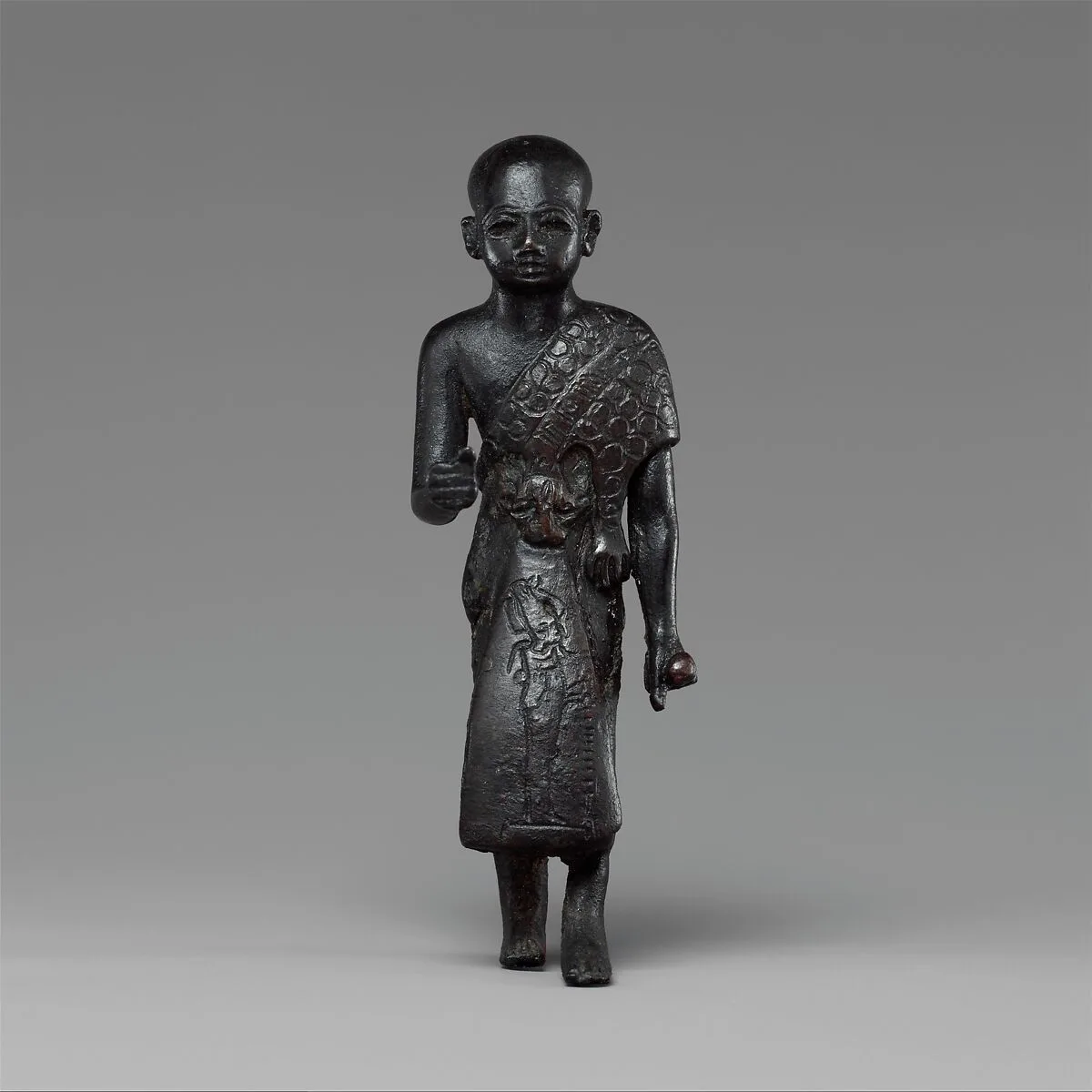 Priest in a leopard skin cloak with an inscription and Osiris on his skirt — Unknown