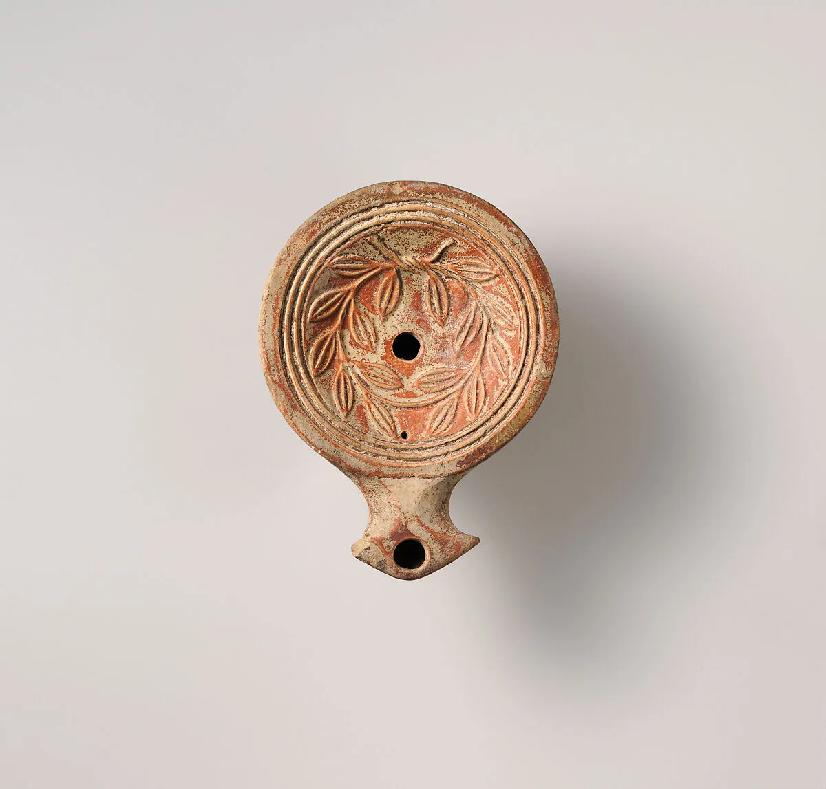 Terracotta oil lamp — Unknown