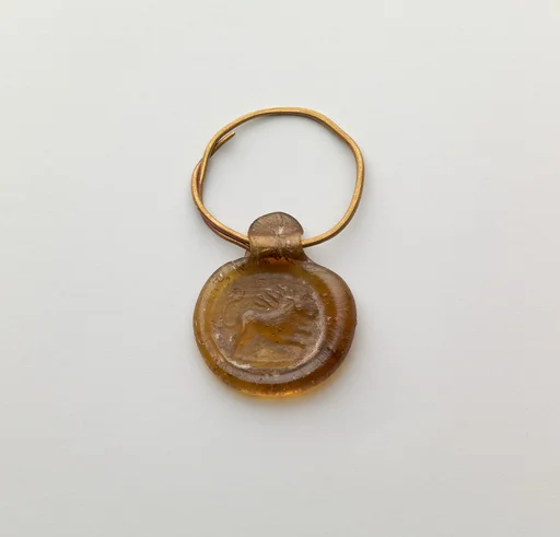 Gold hoop with glass pendant stamped disk