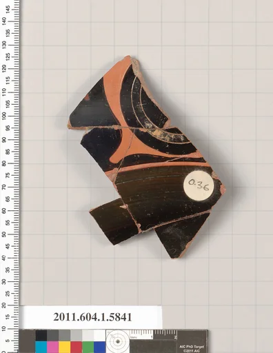 Terracotta fragment of a kylix: eye-cup (drinking cup)
