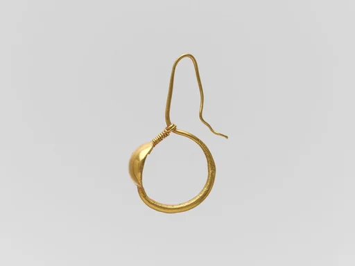 Gold earring with convex disk