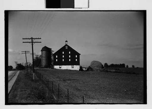 [One 35mm Film Frame: Farm Buildings and Silo, From Road, Illinois?]