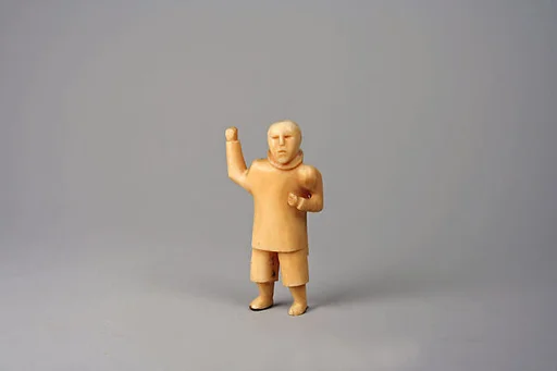 Bone Figure of Standing Man in Parka