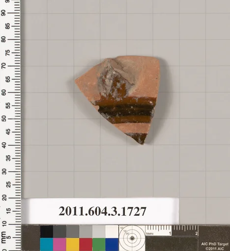 Terracotta fragment of a kylix: Band or lip cup (drinking cup)