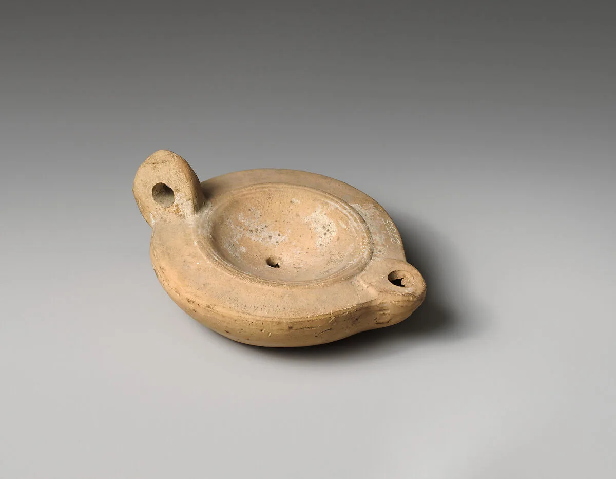 Terracotta oil lamp — Unknown