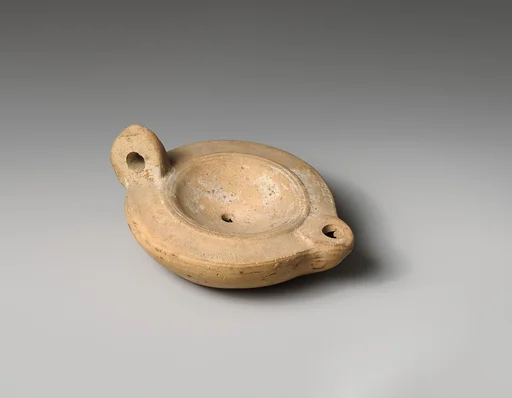 Terracotta oil lamp