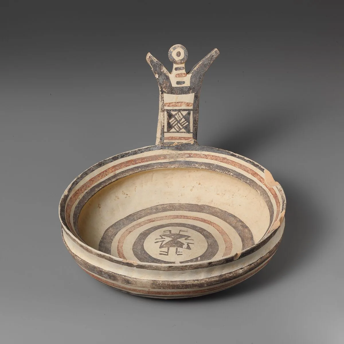 Terracotta bowl with vertical handle — Unknown