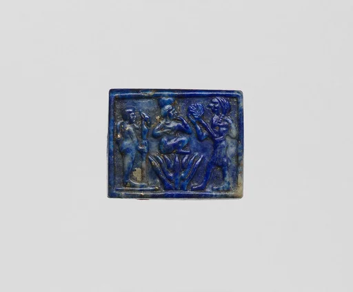 Plaque with Harpokrates (or similar) on a lotus, Ptah and Re-Harakhty(?)