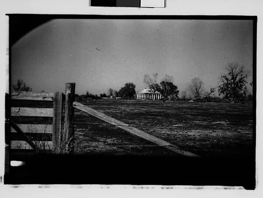 [Plantation House in Field, From Automobile, New Orleans Vicinity, Louisiana]