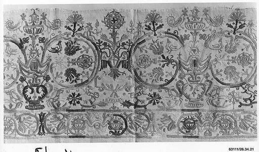 Portion of a dress border