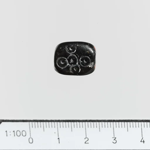 Serpentine triangular prism with circles