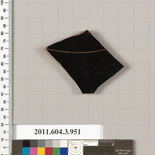 Terracotta fragment of a lekanis lid (covered dish)