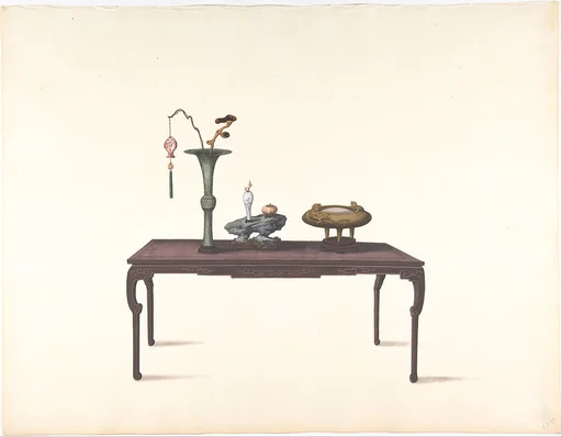 Long Dark Table with Decorative Objects