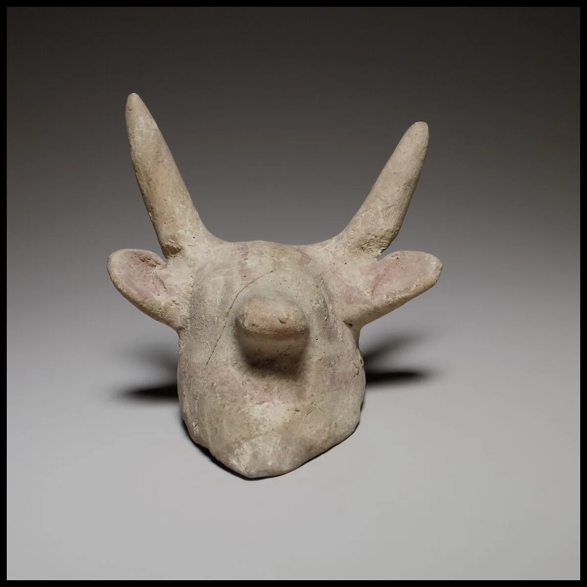 Terracotta mask in the form of a bull — Unknown