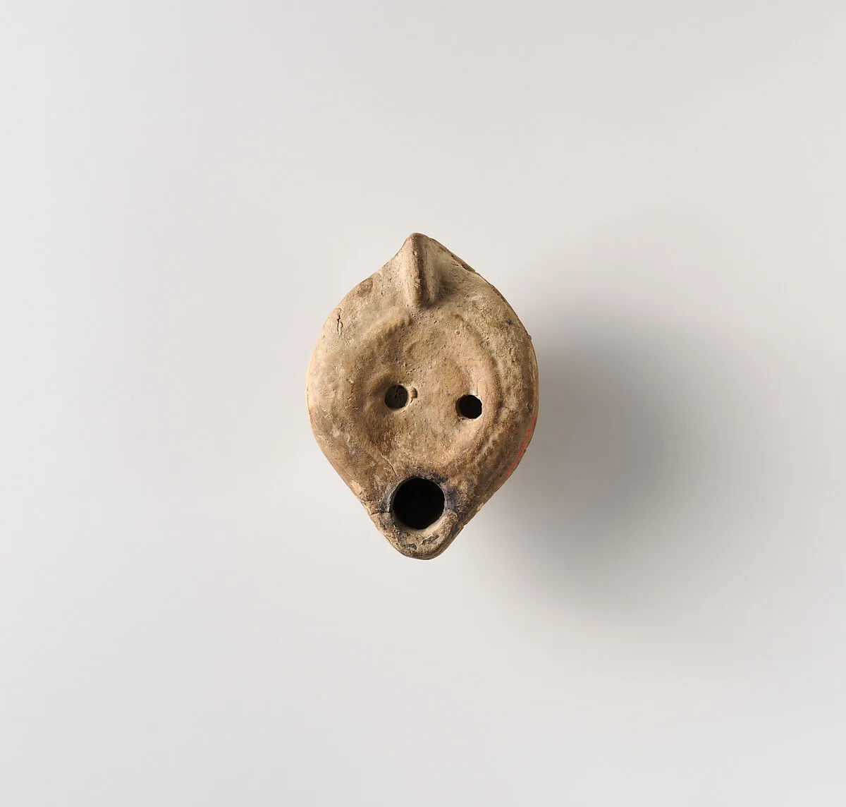 Terracotta oil lamp — Unknown