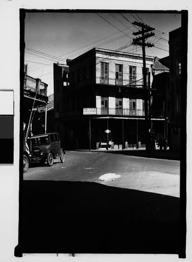 [Street Corner with Building for Sale, New Orleans, Louisiana]