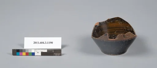 Terracotta fragment of a mastoid (drinking cup with narrow base)