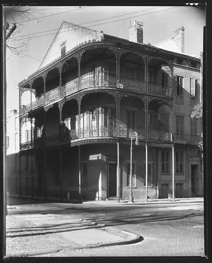 [Cast-Iron Balconied House on Corner, New Orleans, Louisiana]