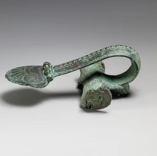 Bronze handle of an oinochoe (jug)