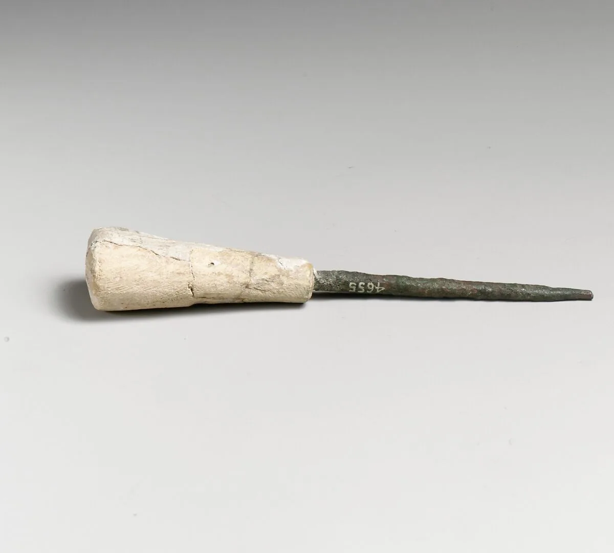 Bronze awl with bone handle — Unknown
