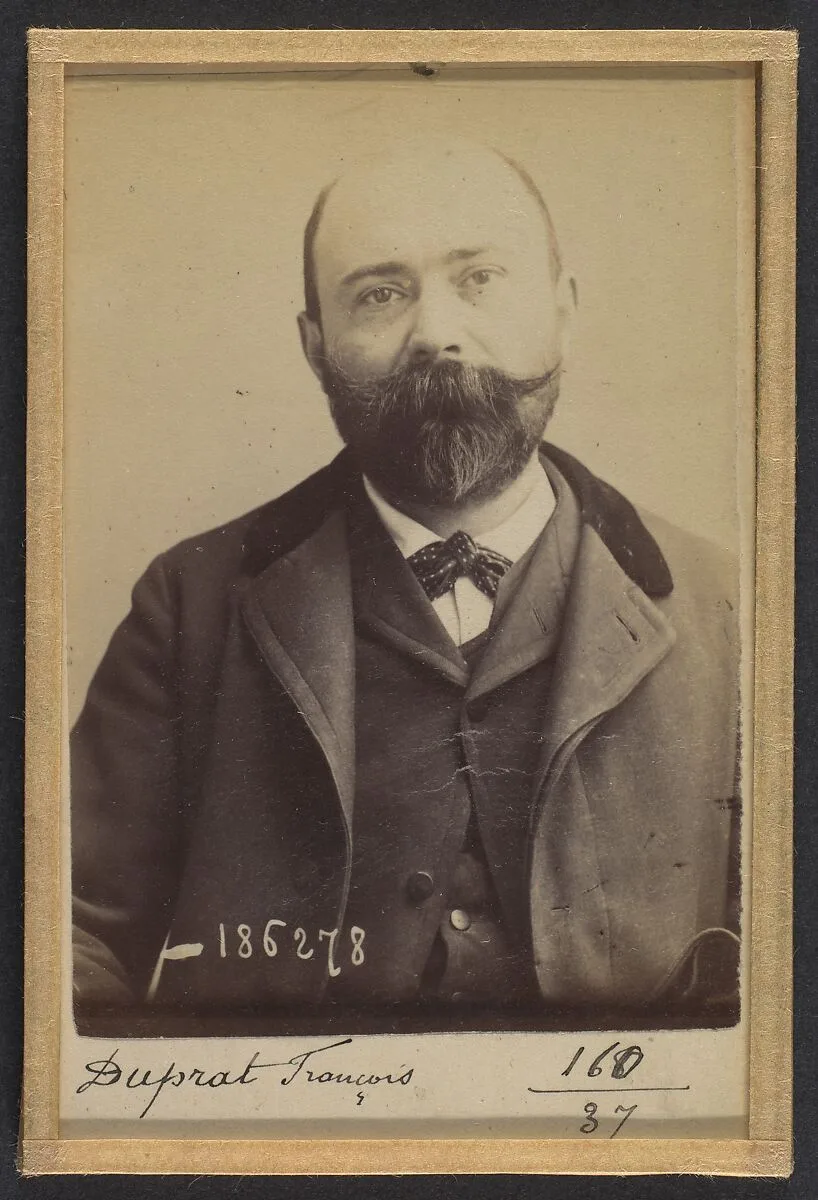 Duprat. François, Louis. 34 ans, né à St-Martin (Gers). Marchand de vins. Anarchiste. 27/4/92. — Alphonse Bertillon