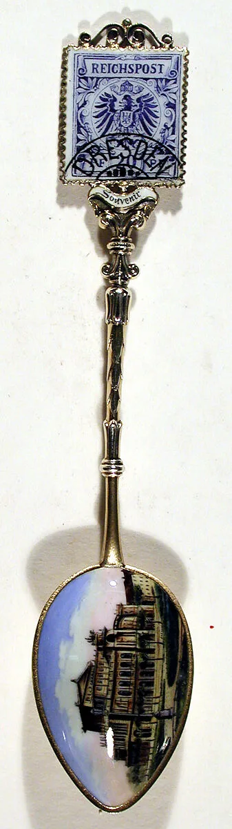 Souvenir spoon with a Dresden building (possibly General Post Office) and finial in form of postage stamp — Unknown