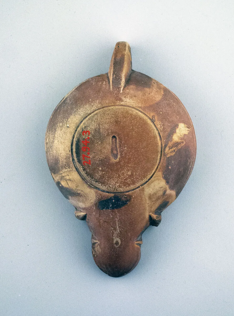 Terracotta oil lamp — Unknown