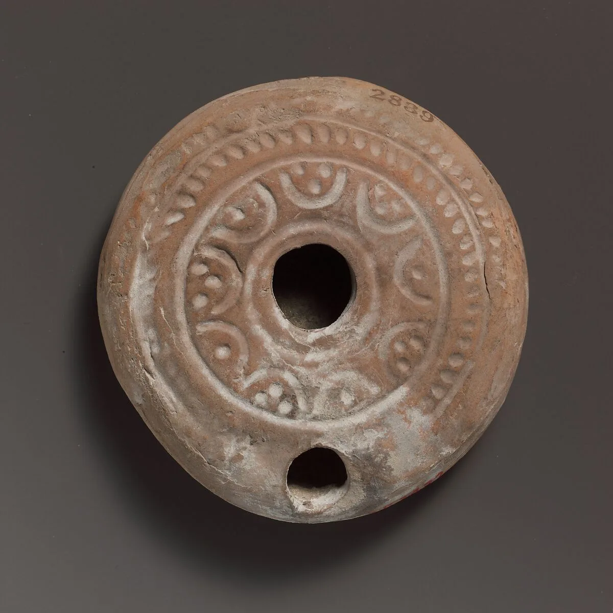 Terracotta oil lamp — Unknown