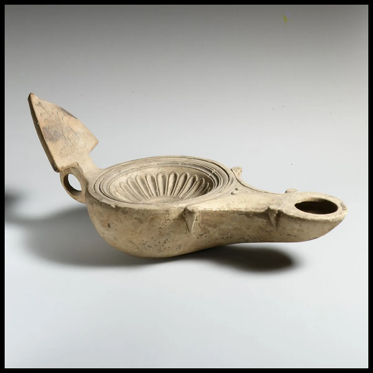 Terracotta lamp — Unknown